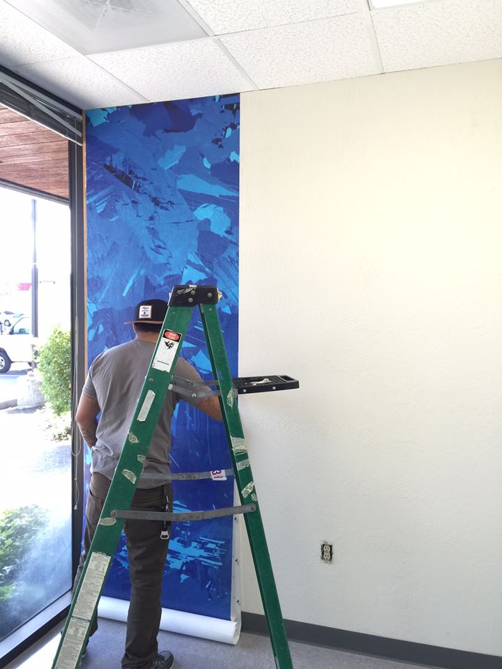 Prepping the wall for graphic contact paper.