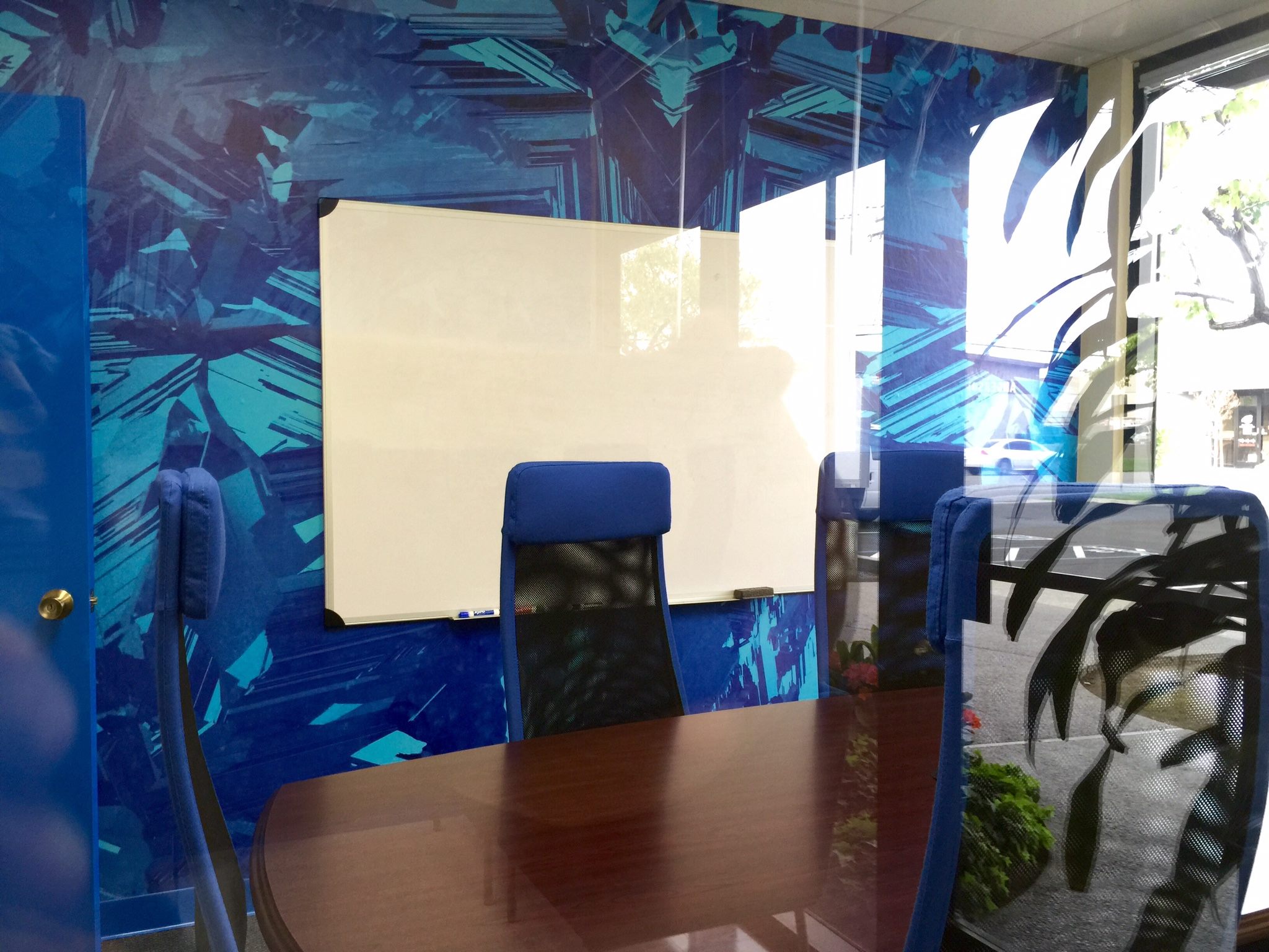 Gridtential meeting room completed makeover from bland white walls.